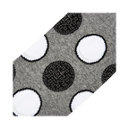 Close-up detail shot highlighting the Oreo cookie pattern on the socks.