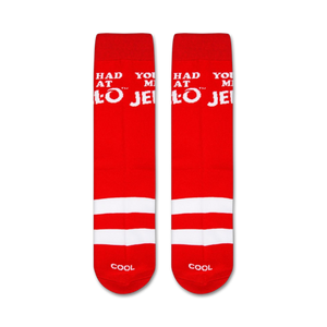 A red sock with white lettering that reads 