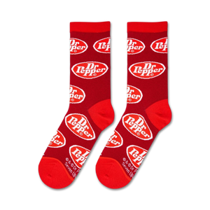 A close up of red socks with a white oval logo that says Dr. Pepper in white with a red outline.