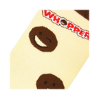 Close-up detail shot of Whoppers sock, emphasizing the Whopper-face emoji and text detail.