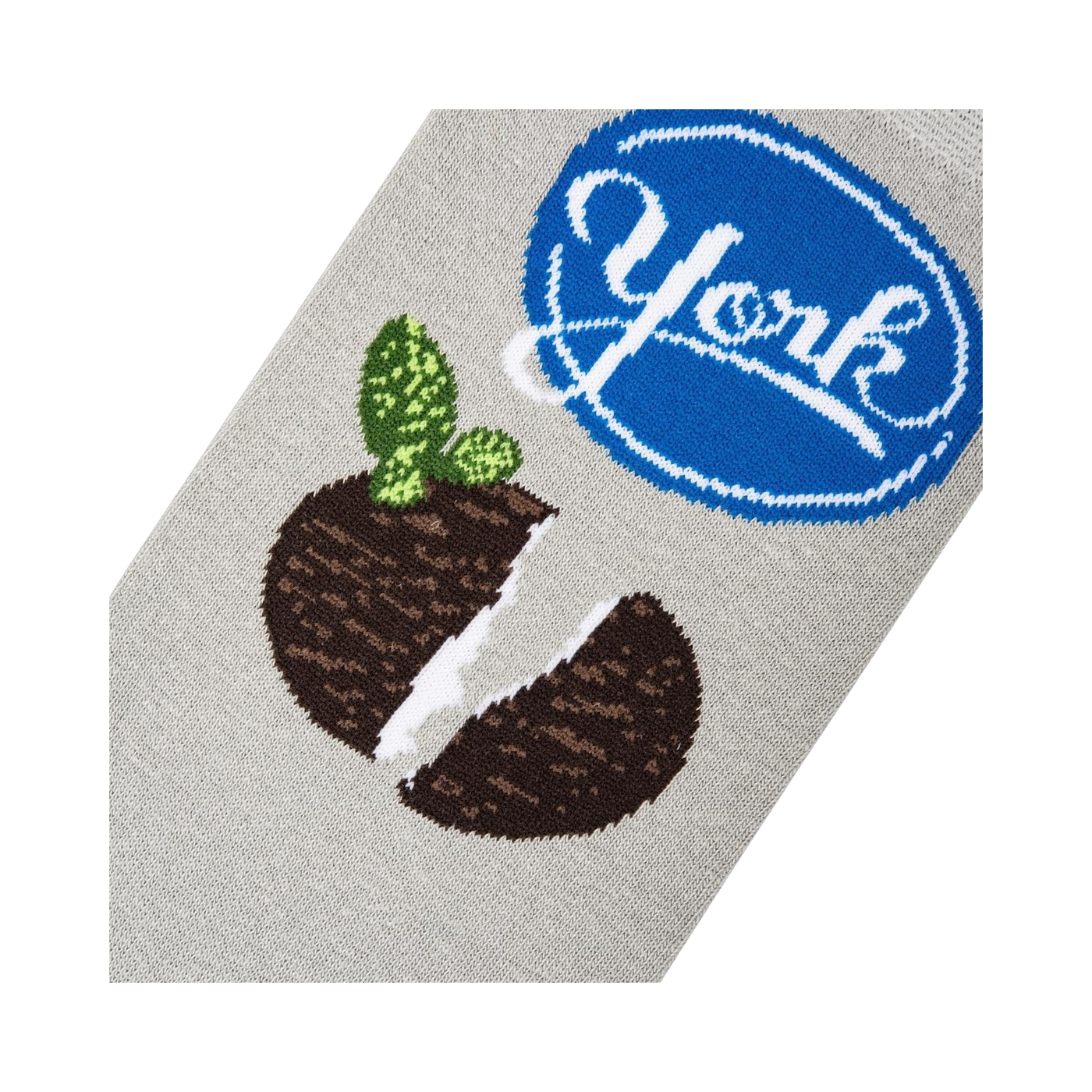 Close-up detail shot of the York Peppermint Pattie design on a grey sock, showing the texture and print quality.