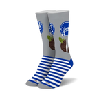 Pair of crew socks in grey and blue.  The socks feature a York Peppermint Pattie design with the brand logo and a peppermint pattie graphic.