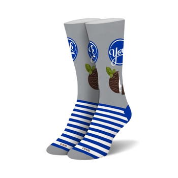 round chocolate candies with peppermint filling, blue and white stripes at ankle, gray with york written in blue on the leg.  