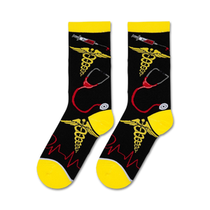 A black sock with a yellow caduceus, a red stethoscope, and a syringe with a red liquid in it.