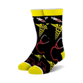 Pair of crew socks in black with yellow and red medical symbols: caduceus, stethoscope, and EKG line.  Fun and quirky design.
