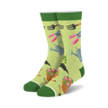 Pair of crew socks, light green background with gardening tools (watering can, shears, trowel) and flowers in pink and orange.