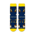 Flatlay showcasing the Lawyer socks, highlighting their navy blue color and gold design details.