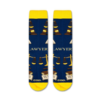 Flatlay showcasing the Lawyer socks, highlighting their navy blue color and gold design details.