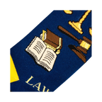 Close-up detail shot of the sock's design, focusing on the gavel, scales of justice, and open book illustrations.