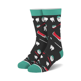 black novelty socks with cartoon teeth, toothbrush, floss picks, and toothpaste pattern. perfect for dentists, dental hygienists, and lovers of oral hygiene.  