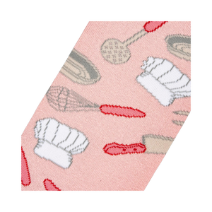 Close-up detail shot of the Chef sock fabric, highlighting the pink background and kitchen utensil pattern.