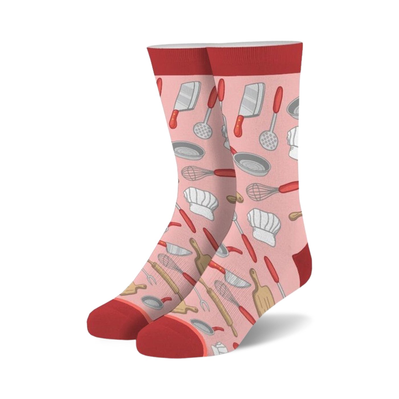 Pair of crew socks in pink, red, and cream.  Features a fun pattern of chef hats, whisks, spatulas, and other kitchen tools.