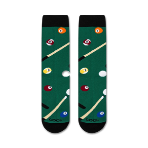 A green pool table sock with a pool cue and billiard balls in the background.