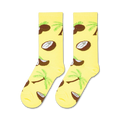 Flatlay showcasing a pair of yellow crew socks with a coconut and palm tree design.