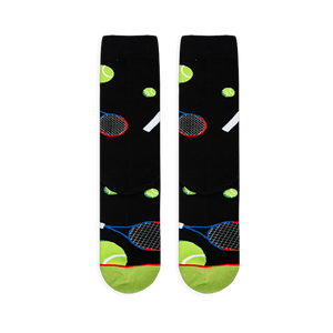 Flat lay of black socks showing the tennis ball and racket pattern, with a neon green toe and red stripe at the bottom.