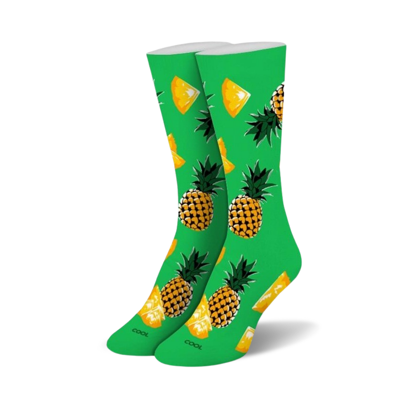 Pair of crew socks, lime green with yellow and orange pineapples and pineapple slices.