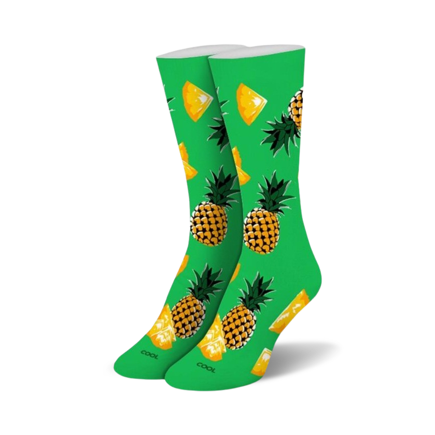 Pair of crew socks, lime green with yellow and orange pineapples and pineapple slices.