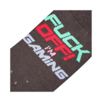 Close-up detail shot of the sock's 'Fuck Off I'm Gaming' text and pixelated design.