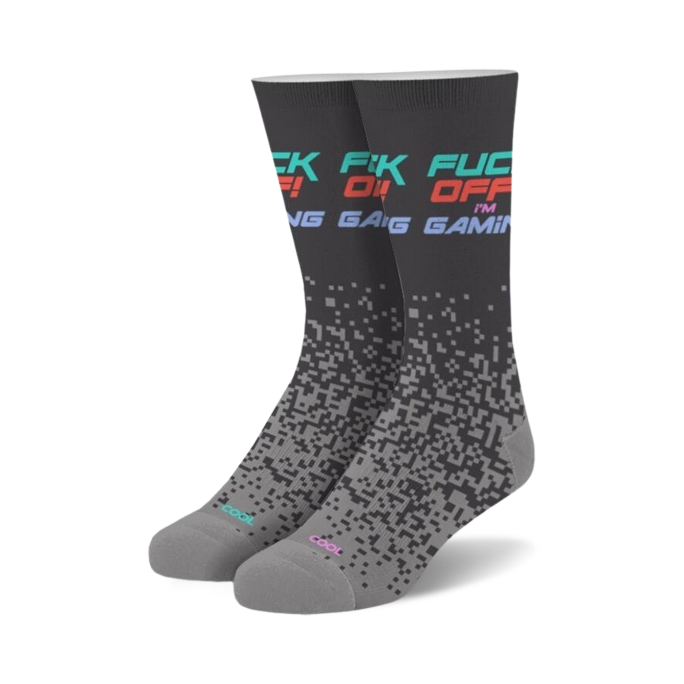 Pair of crew socks in dark gray with 'Fuck Off I'm Gaming' text in teal, pink, and red. Pixelated design fades down the sock.