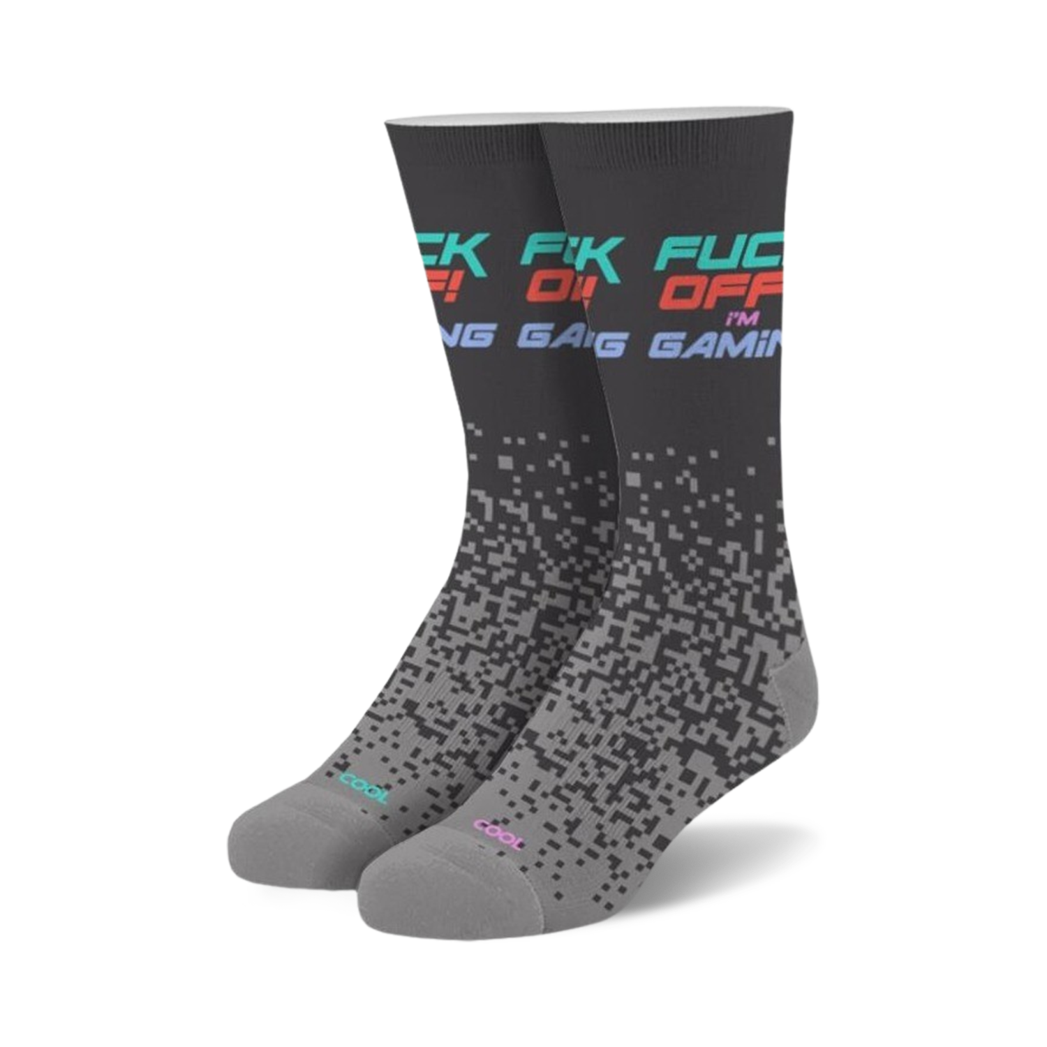 Pair of crew socks in dark gray with 'Fuck Off I'm Gaming' text in teal, pink, and red. Pixelated design fades down the sock.