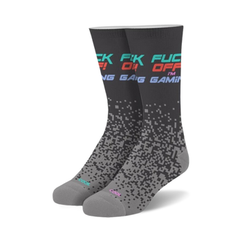 black and gray crew socks with colorful geometric pattern featuring the words "fuck off i'm gaming."  