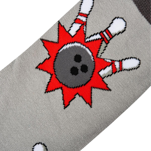 A gray sock with a red bowling ball and white bowling pins.