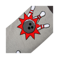 Close-up detail shot of the bowling ball and pins design on the socks.