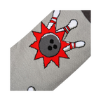 Close-up detail shot of the bowling ball and pins design on the socks.