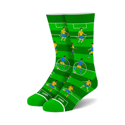 green crew socks with blue and yellow soccer players playing on a white field   