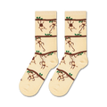 Flatlay showcasing a pair of beige crew socks with a playful monkey design.