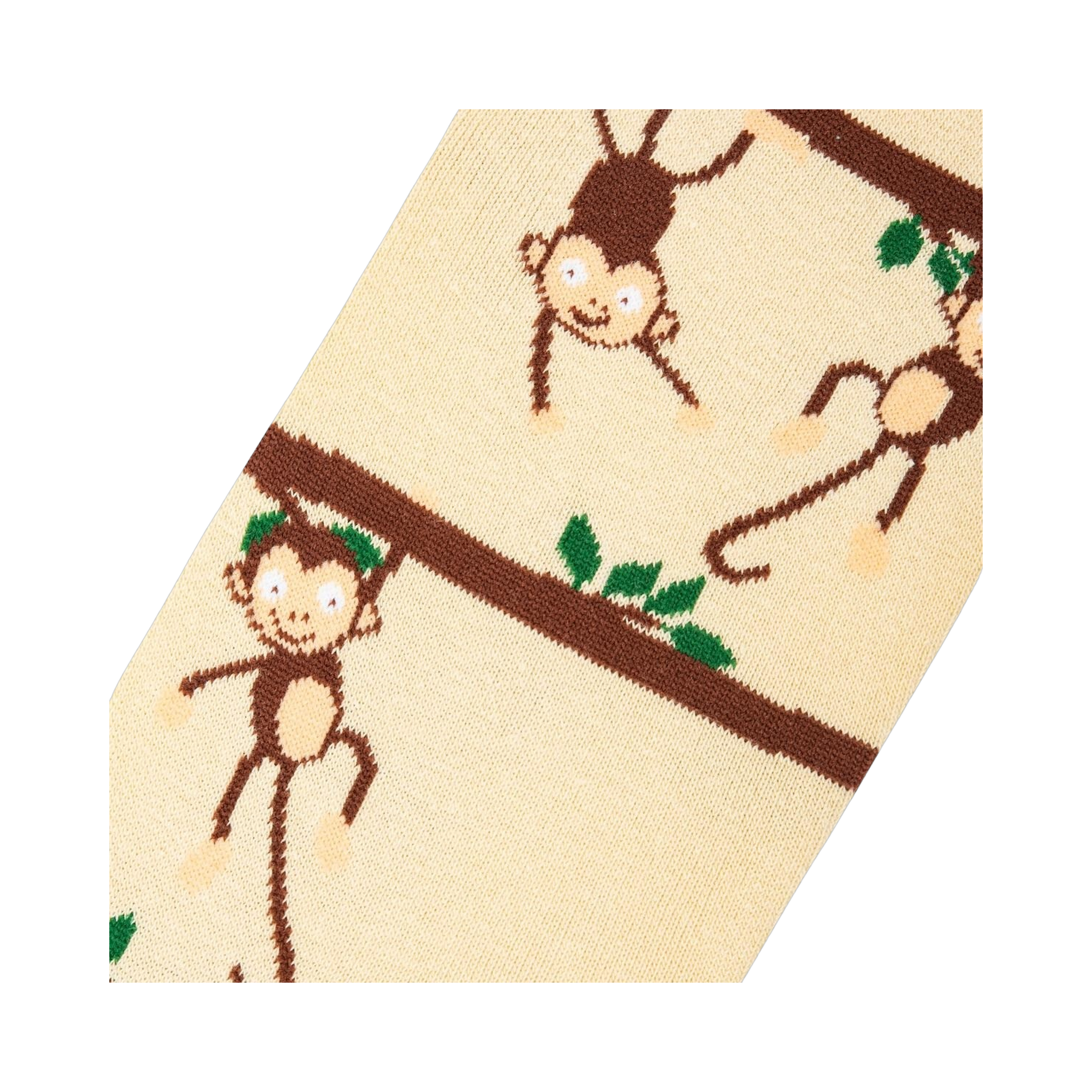 Close-up detail shot highlighting the whimsical monkey and branch design on the socks.