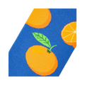 Close-up detail shot of the Oranges sock fabric, showcasing the orange and blue design.