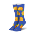 Pair of crew socks; blue background with orange slices and whole oranges.  Fun, casual style.