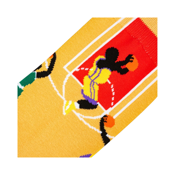 Close-up detail shot of basketball player graphic on the tan basketball sock.