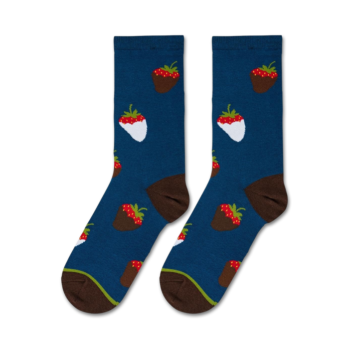 A pair of blue socks with a pattern of strawberries dipped in chocolate.