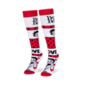 Angled studio shot of Betty Boop knee-high socks standing upright, highlighting the bold red polka dot stripes.