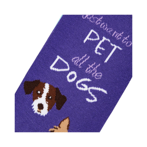 Close-up detail shot of the sock's design, highlighting the adorable dog faces and text.