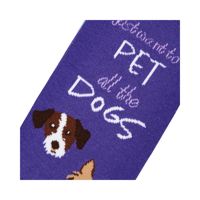 Close-up detail shot of the sock's design, highlighting the adorable dog faces and text.