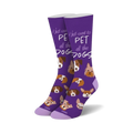 Purple crew socks with a repeating pattern of cute dog faces and the phrase 'I just want to pet all the dogs'.