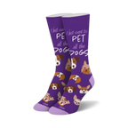 Purple crew socks with a repeating pattern of cute dog faces and the phrase 'I just want to pet all the dogs'.