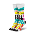 Pair of crew socks. White background with 'Literally No One Cares' text and colorful abstract blocks in teal, pink, orange, and black.