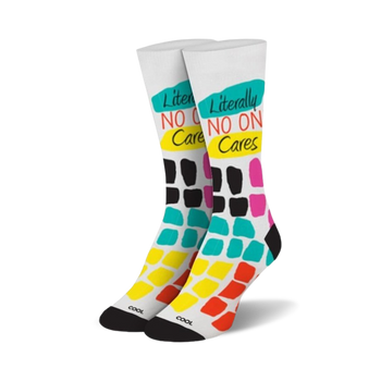  white socks with black text "literally no one cares" and black heels/toes. multi-colored squares pattern on feet.   