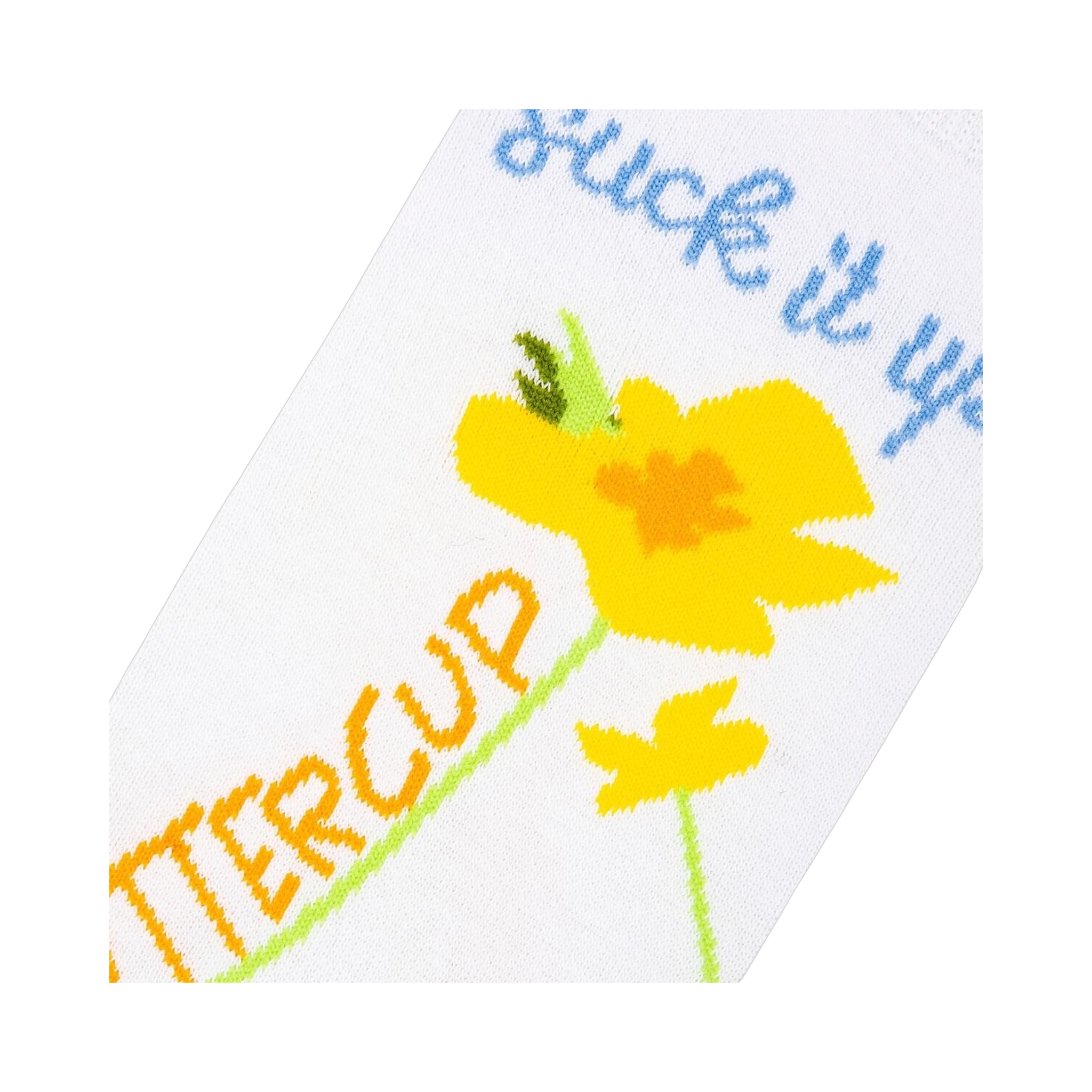 Close-up detail shot of the yellow flower and text design on the sock.