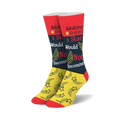 Pair of crew socks in red, black, and yellow.  One sock features a 1-star review graphic and shooting stars.