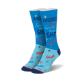 Crew socks in light blue with navy and red accents.  The design includes the phrase 'Kindness is free. Sprinkle that SHIT everywhere!' and shooting stars.