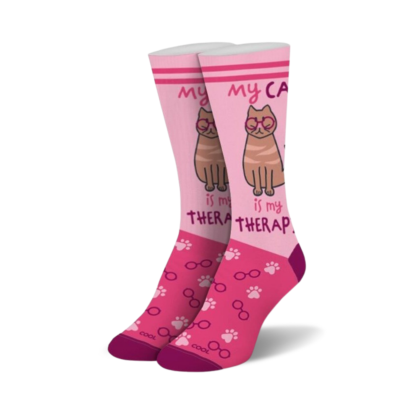Crew socks in pink and maroon featuring a brown cat wearing glasses, paw prints, and the text 'My cat is my therapist'.