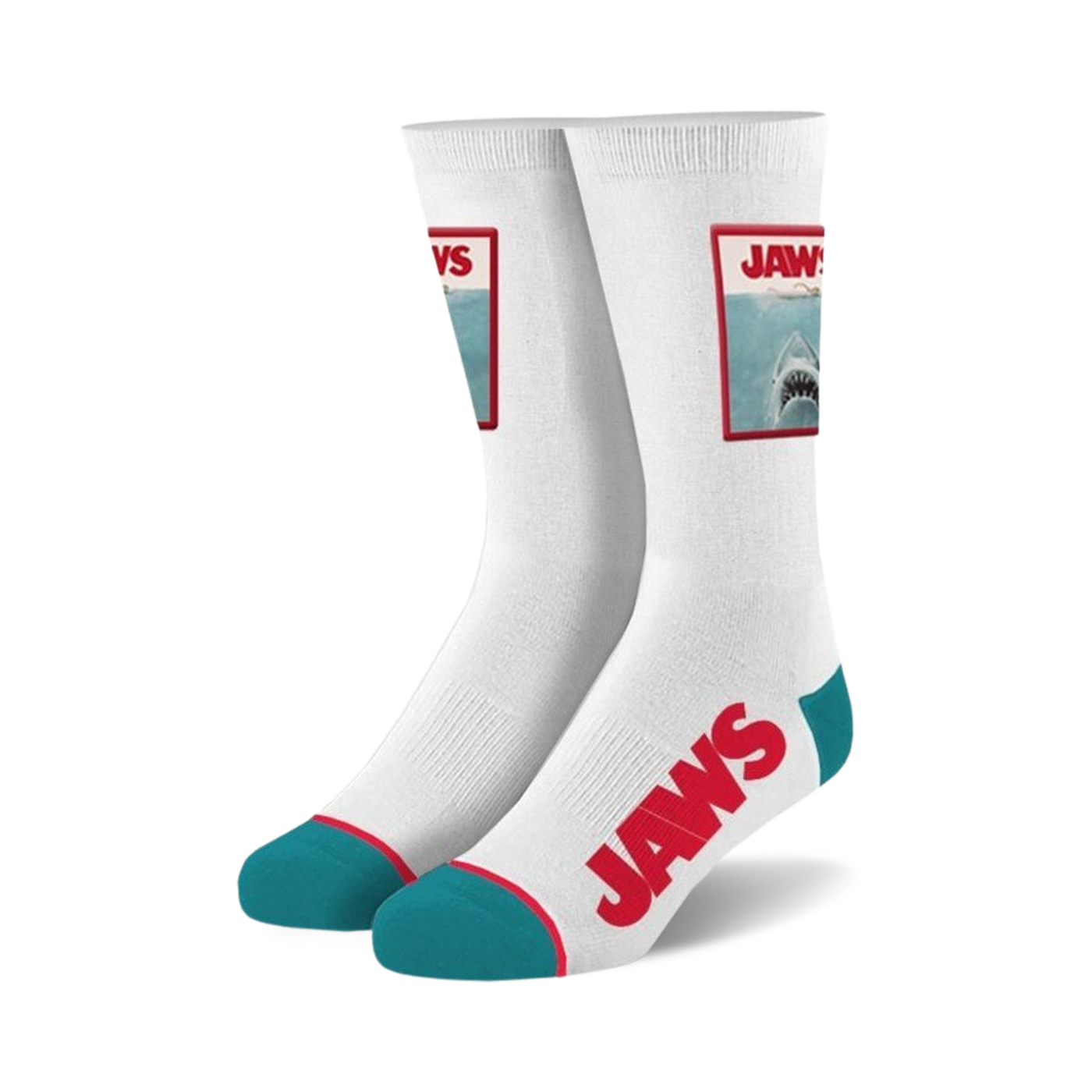 Pair of white crew socks.  Feature a Jaws movie poster image and red 'JAWS' text. Teal accents at the heel and toe.