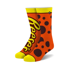 orange crew socks with "reeses" in yellow letters and brown polka dots perfect for men and women who love reeses.   