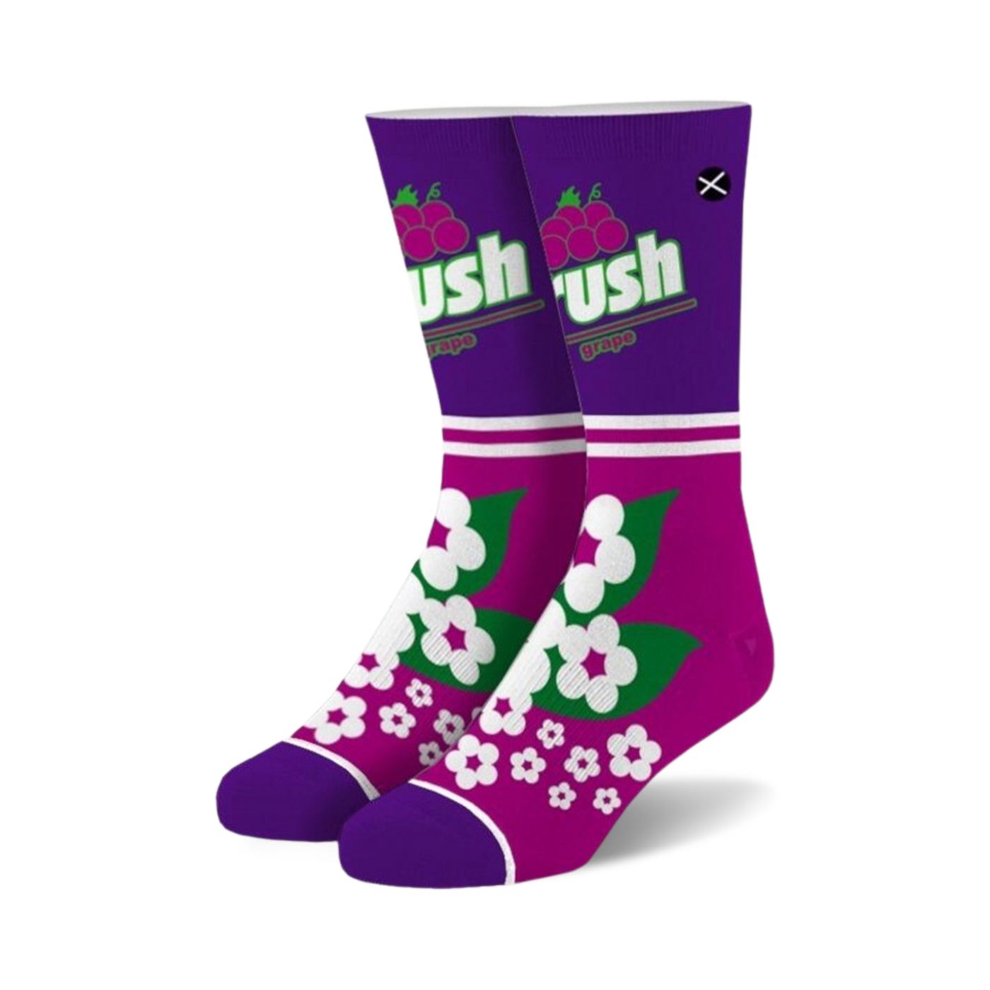 A pair of purple crew socks with a white stripe, Crush Grape logo, and a green and white floral design.