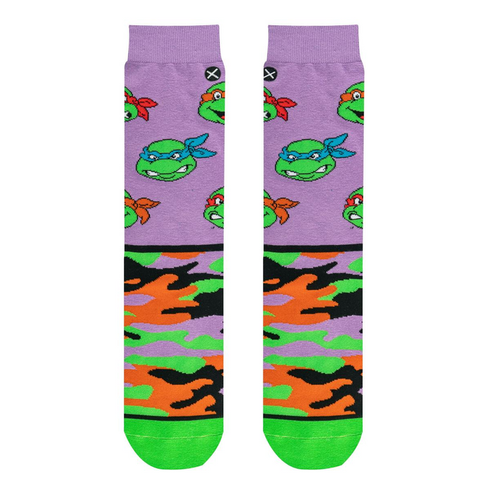Flatlay showcasing a pair of TMNT Turtle Camo crew socks.  The image highlights the sock's design details.
